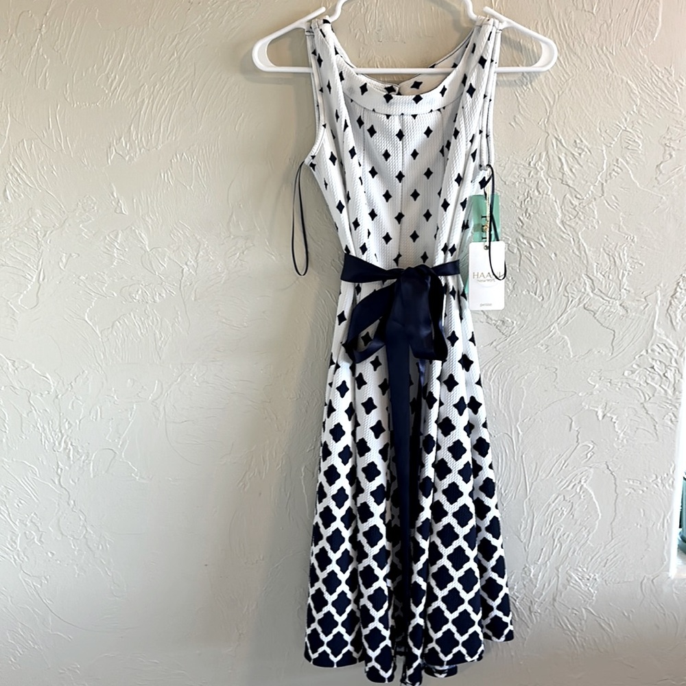 Brand new dress with tags and ribbon